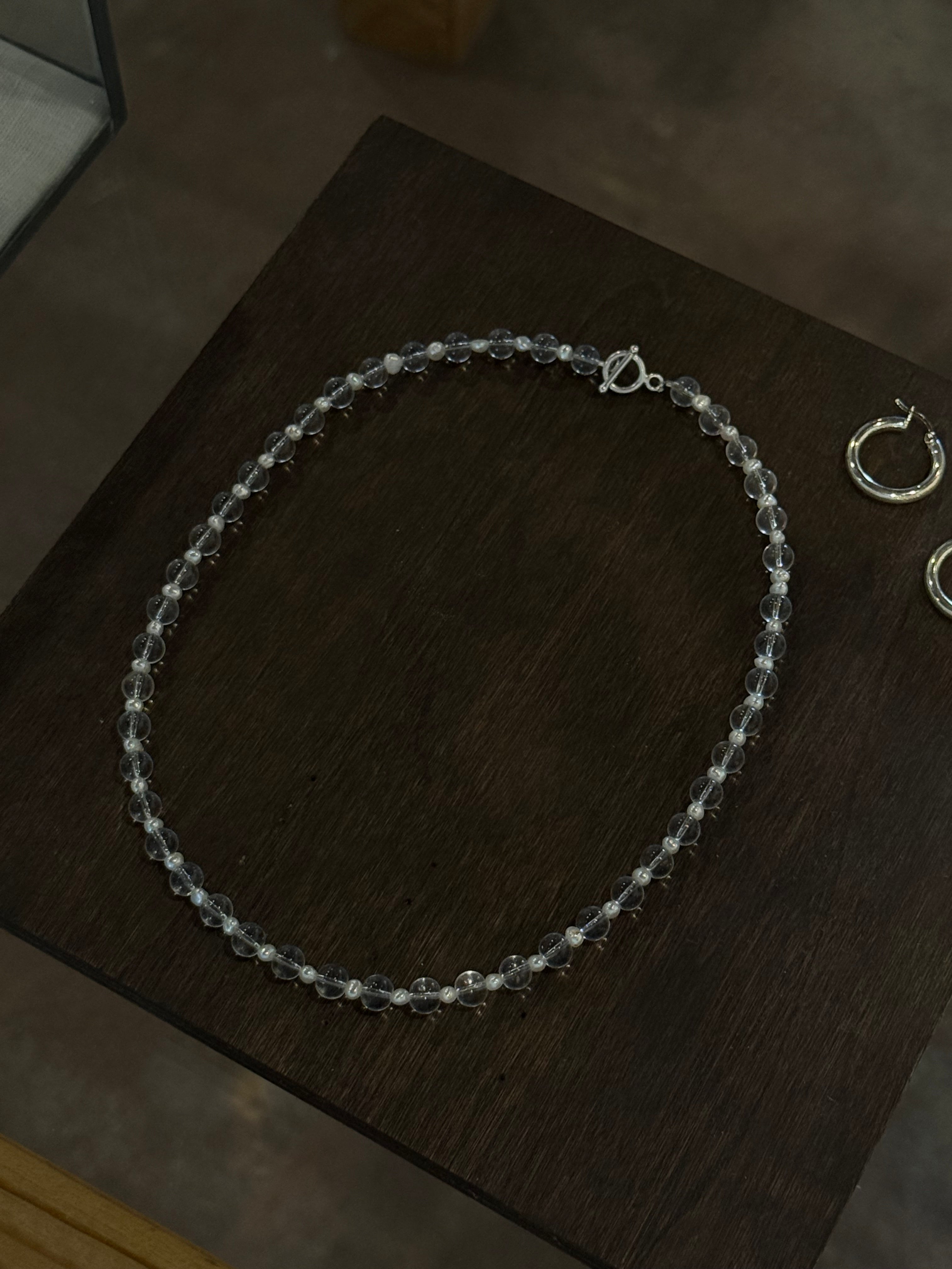 clear with silver necklace