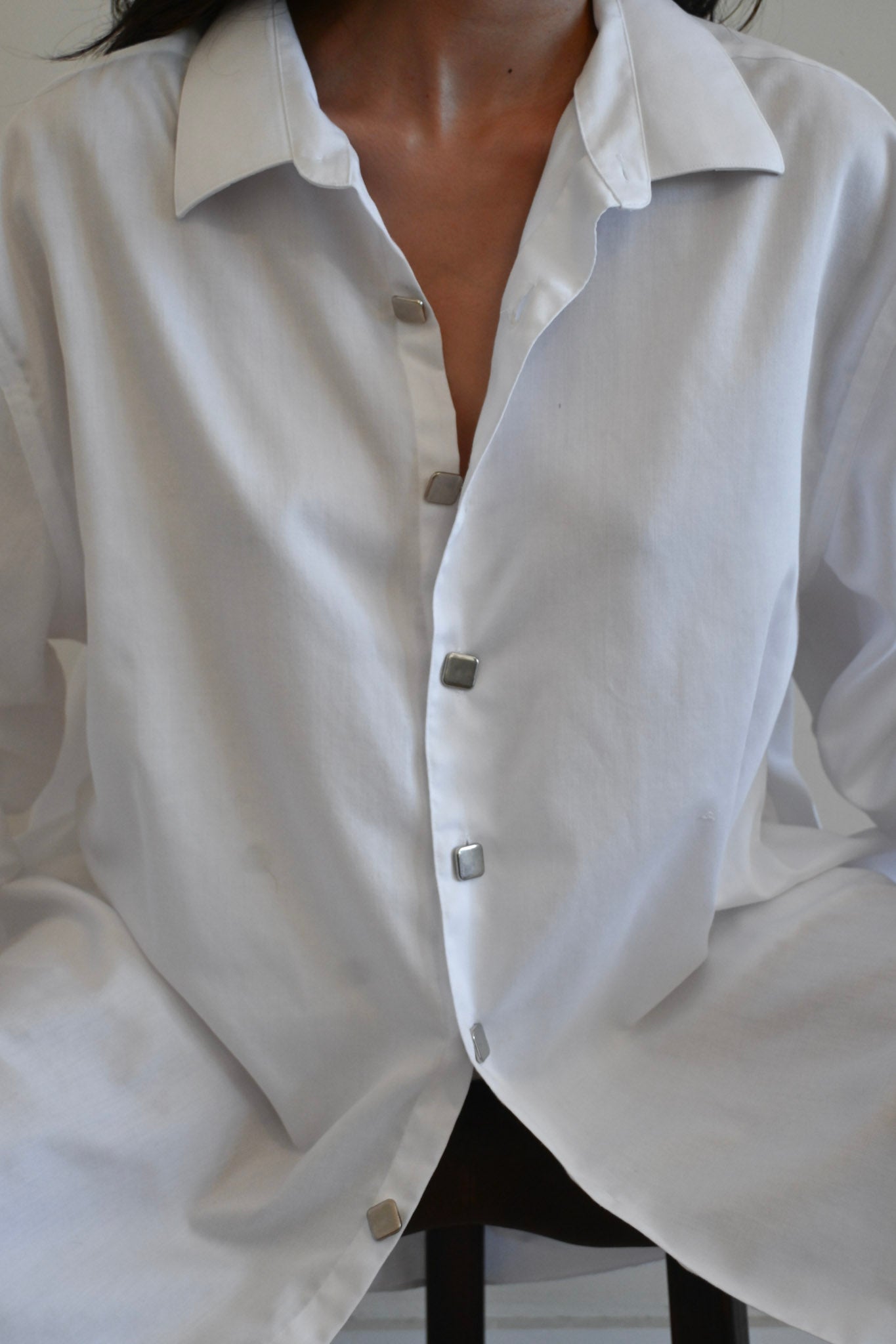 white button up with vintage square buttons