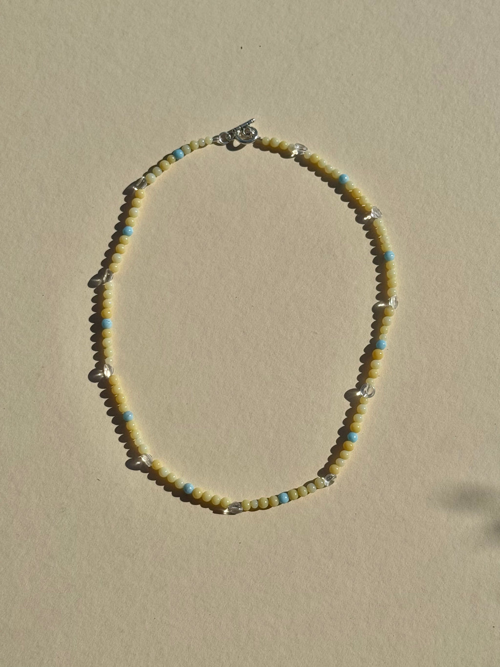 blue | butter | clear necklace
