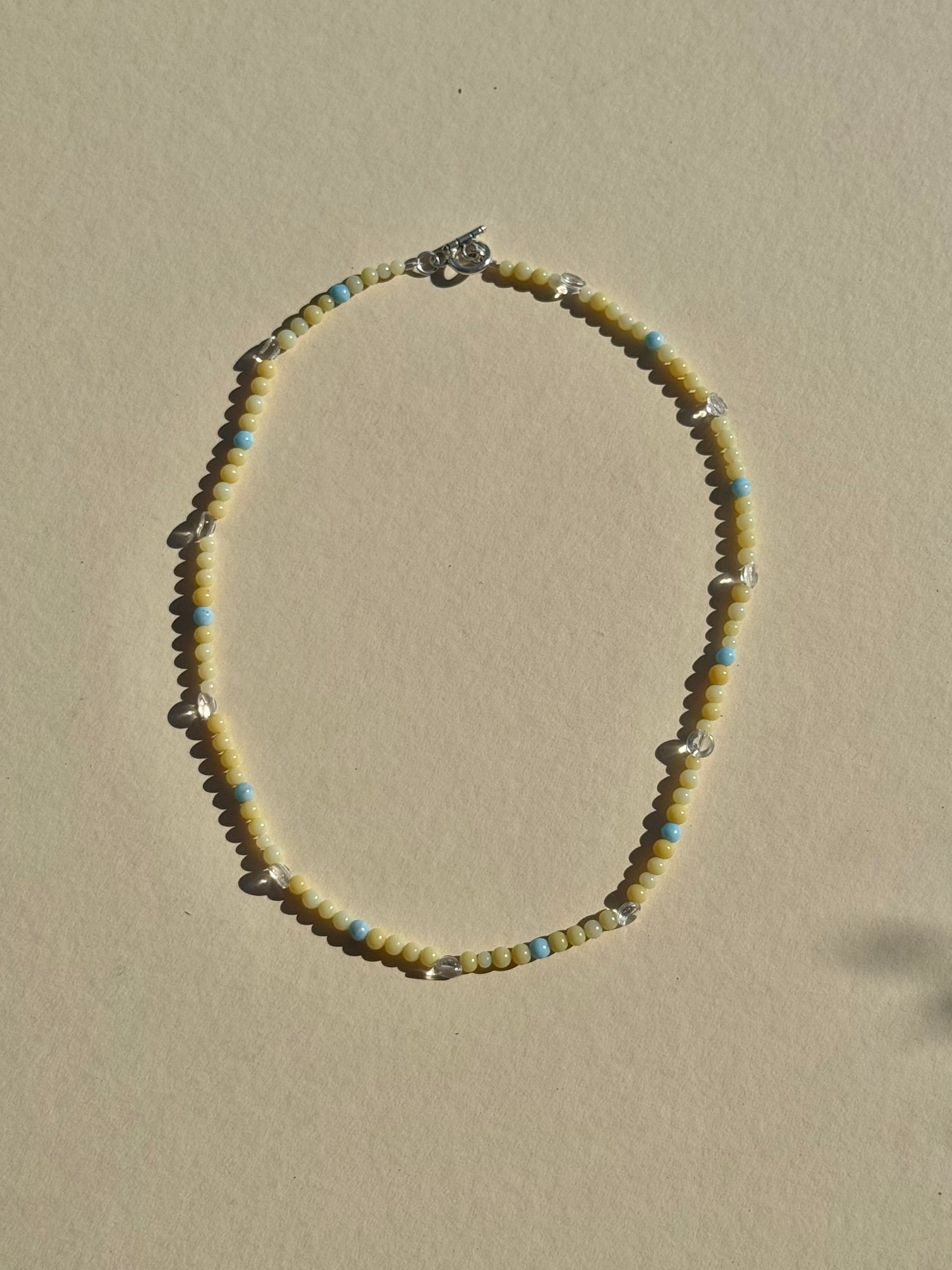 blue | butter | clear necklace