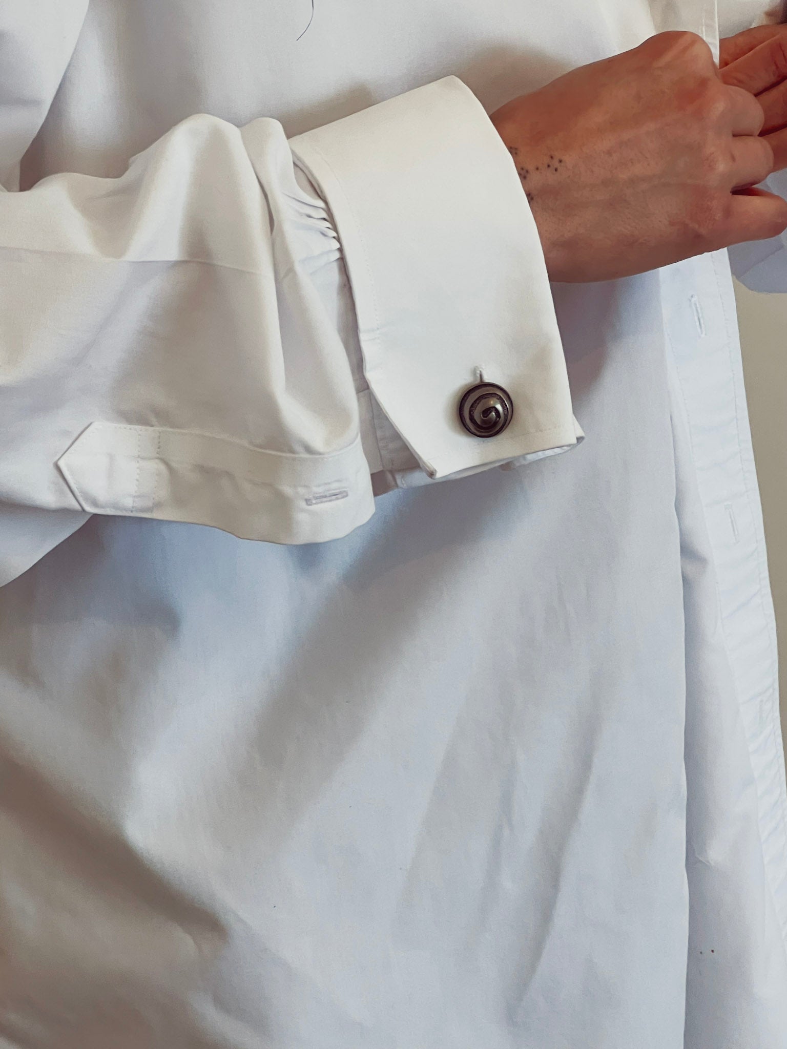 white button up with vintage swirl buttons