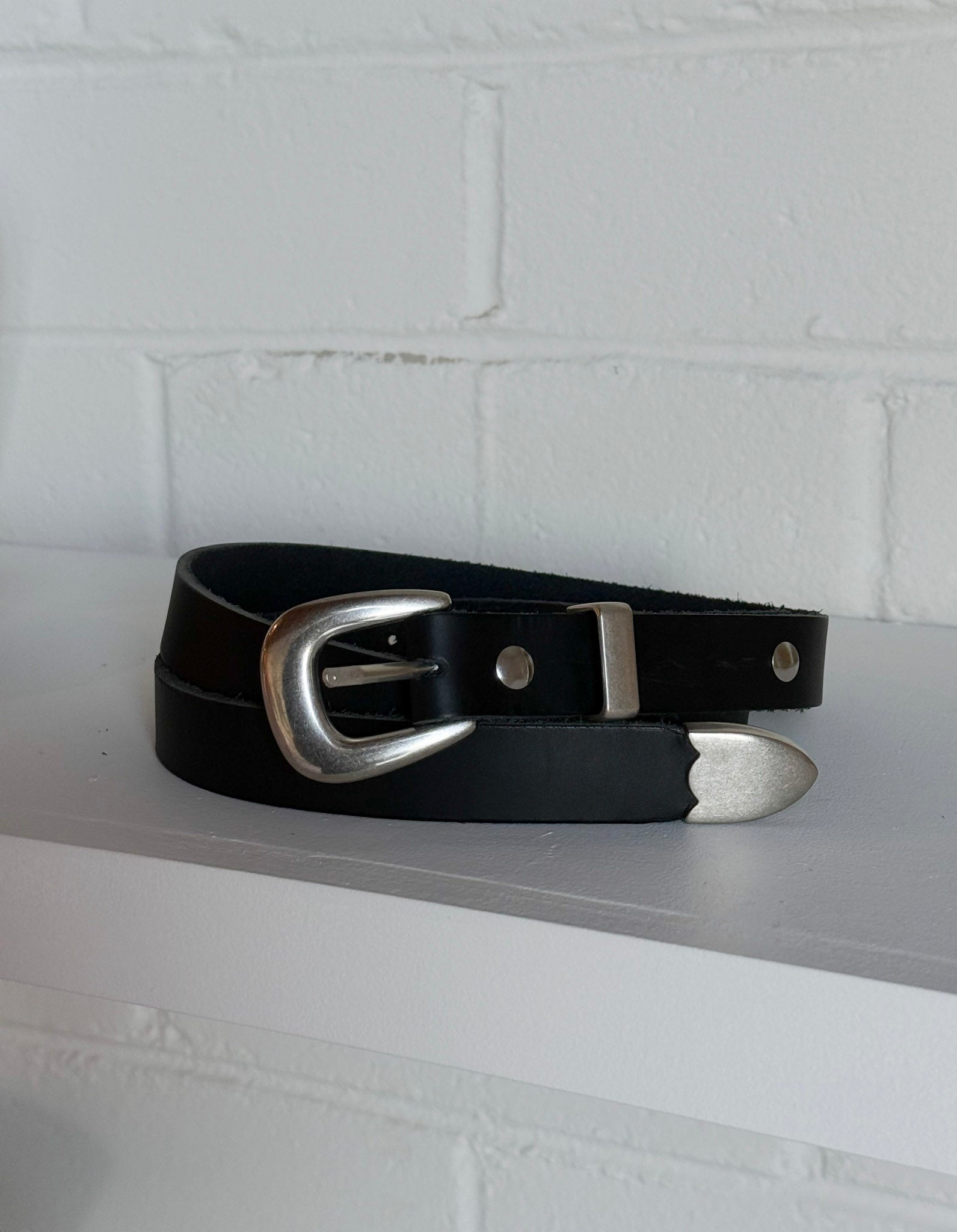 silver tip belt