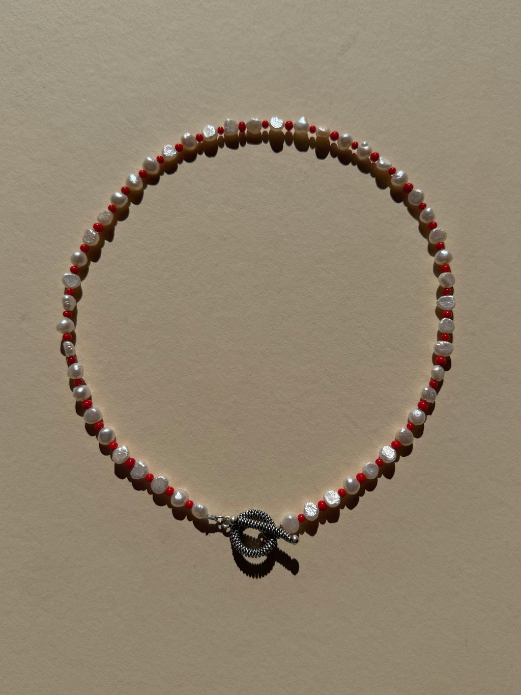 pearl & red necklace