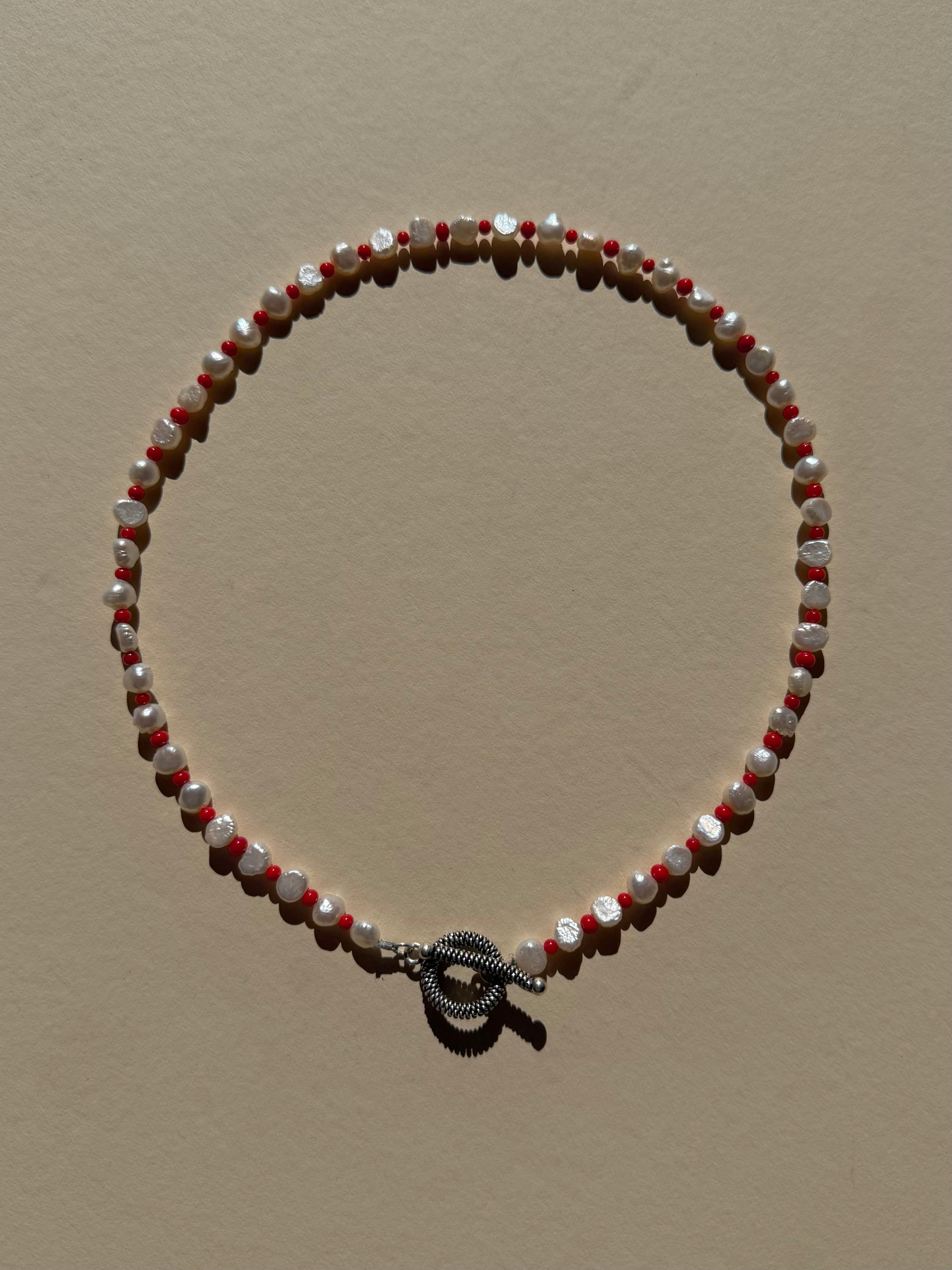 pearl & red necklace