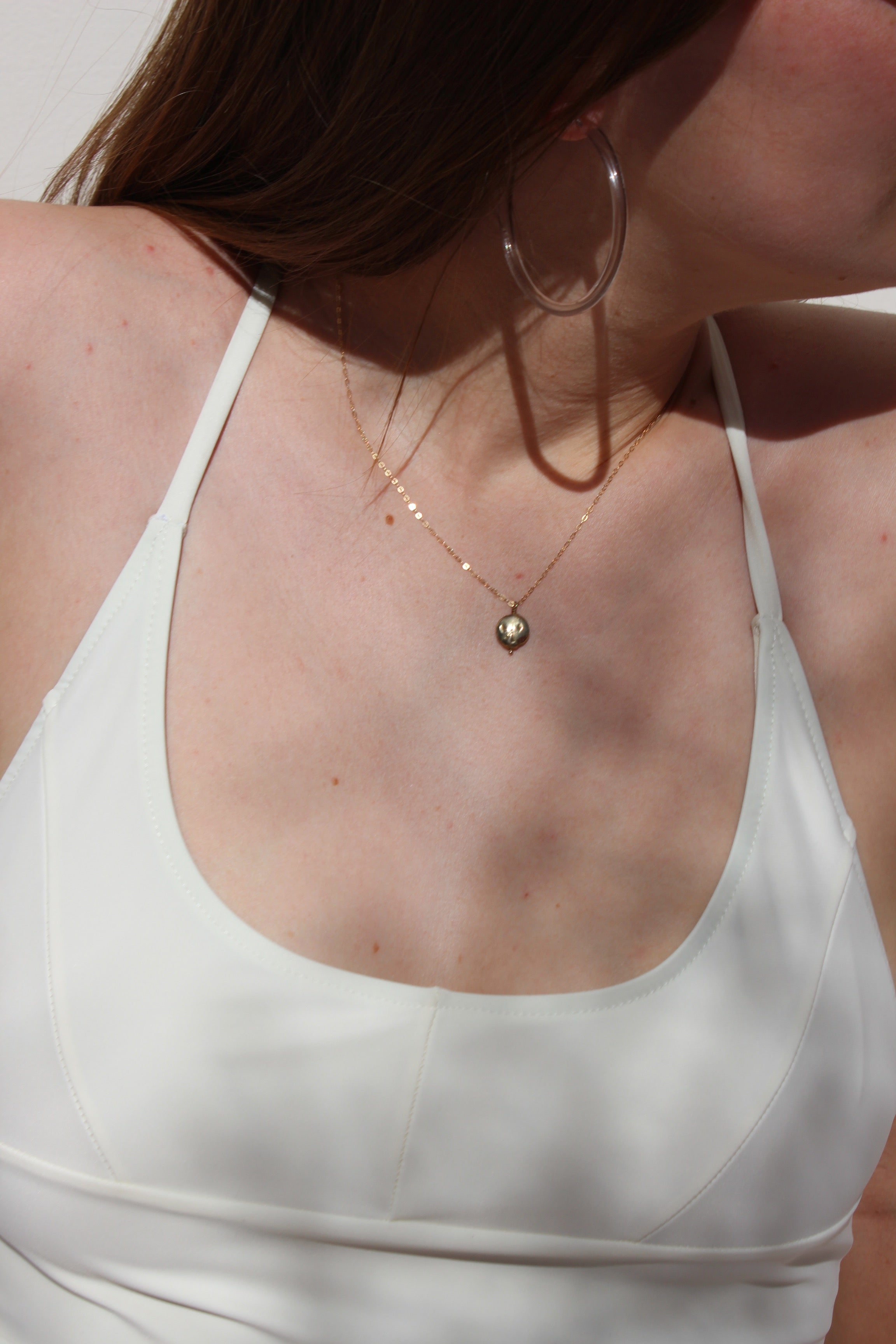 cast pearl medallion