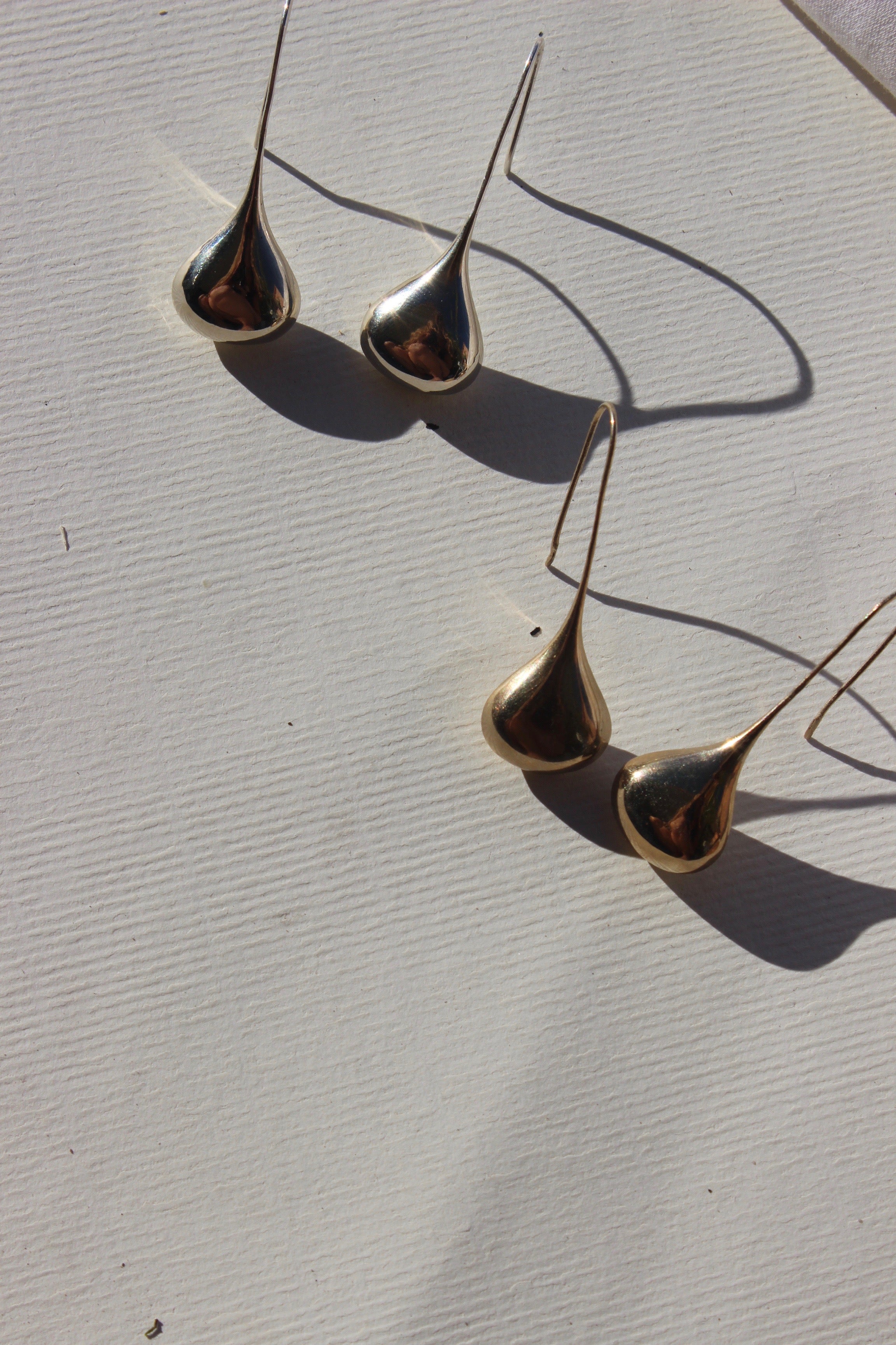 cast teardrop earrings