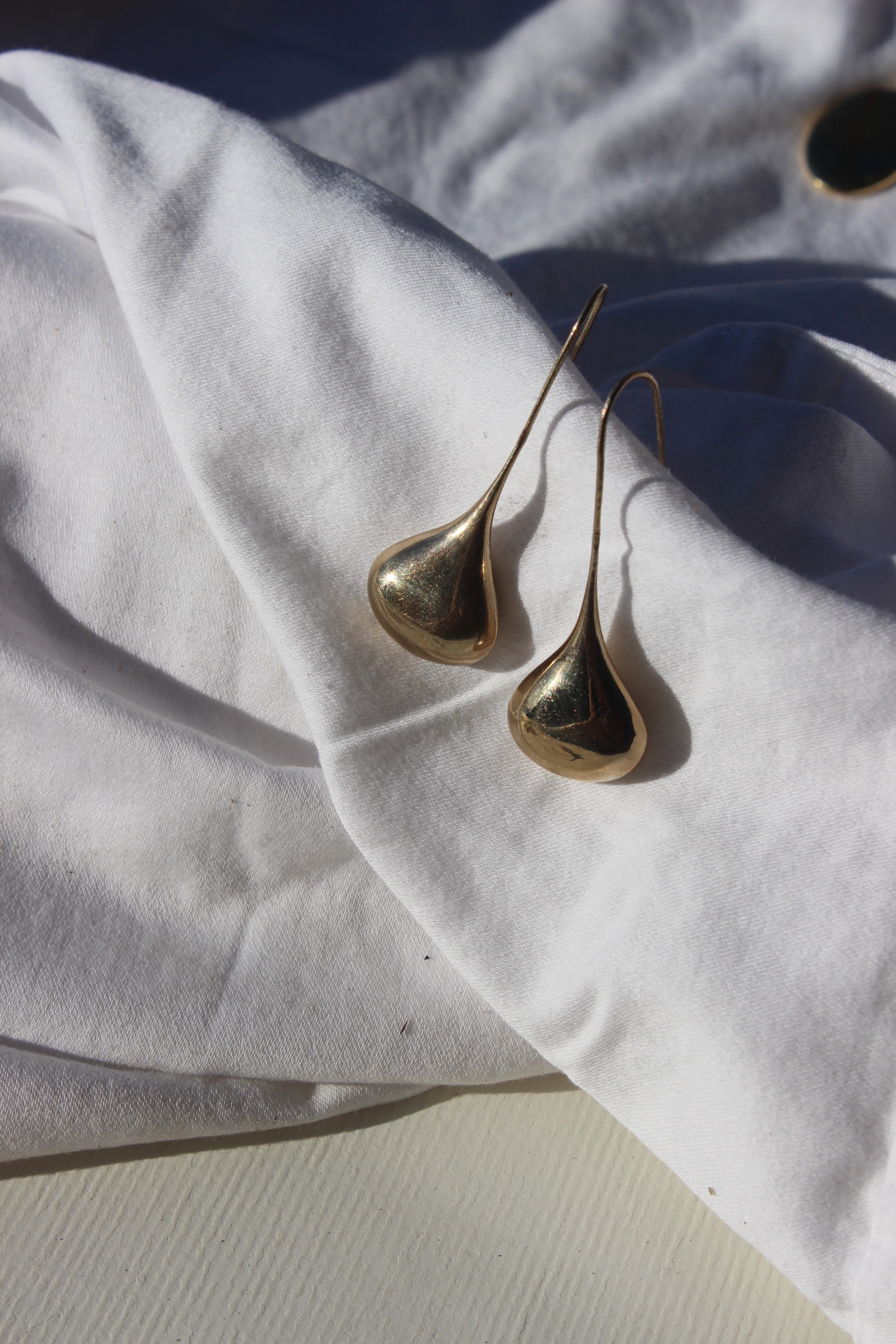 cast teardrop earrings
