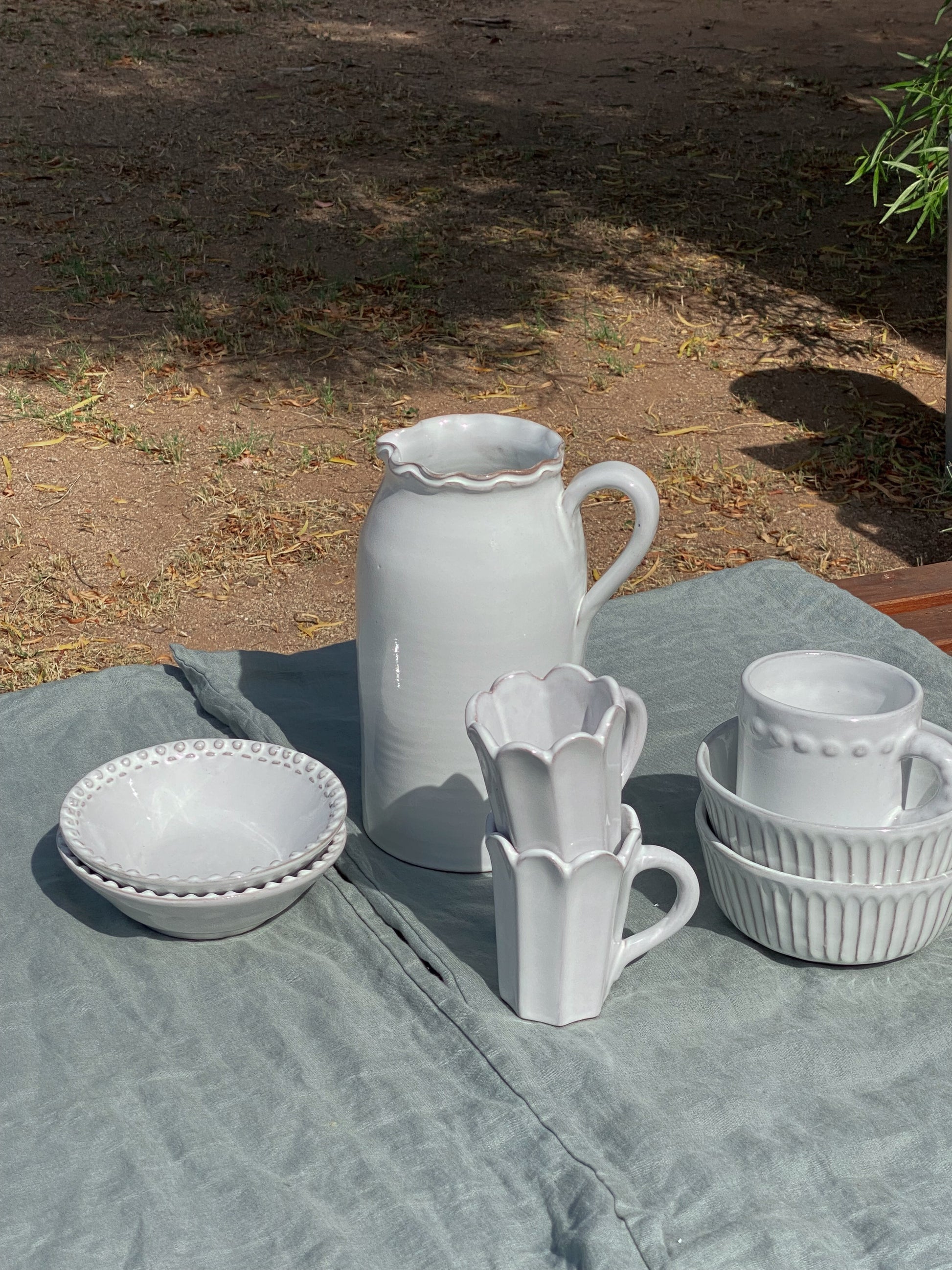 white terracotta pitcher