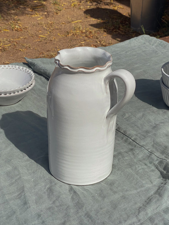 white terracotta pitcher