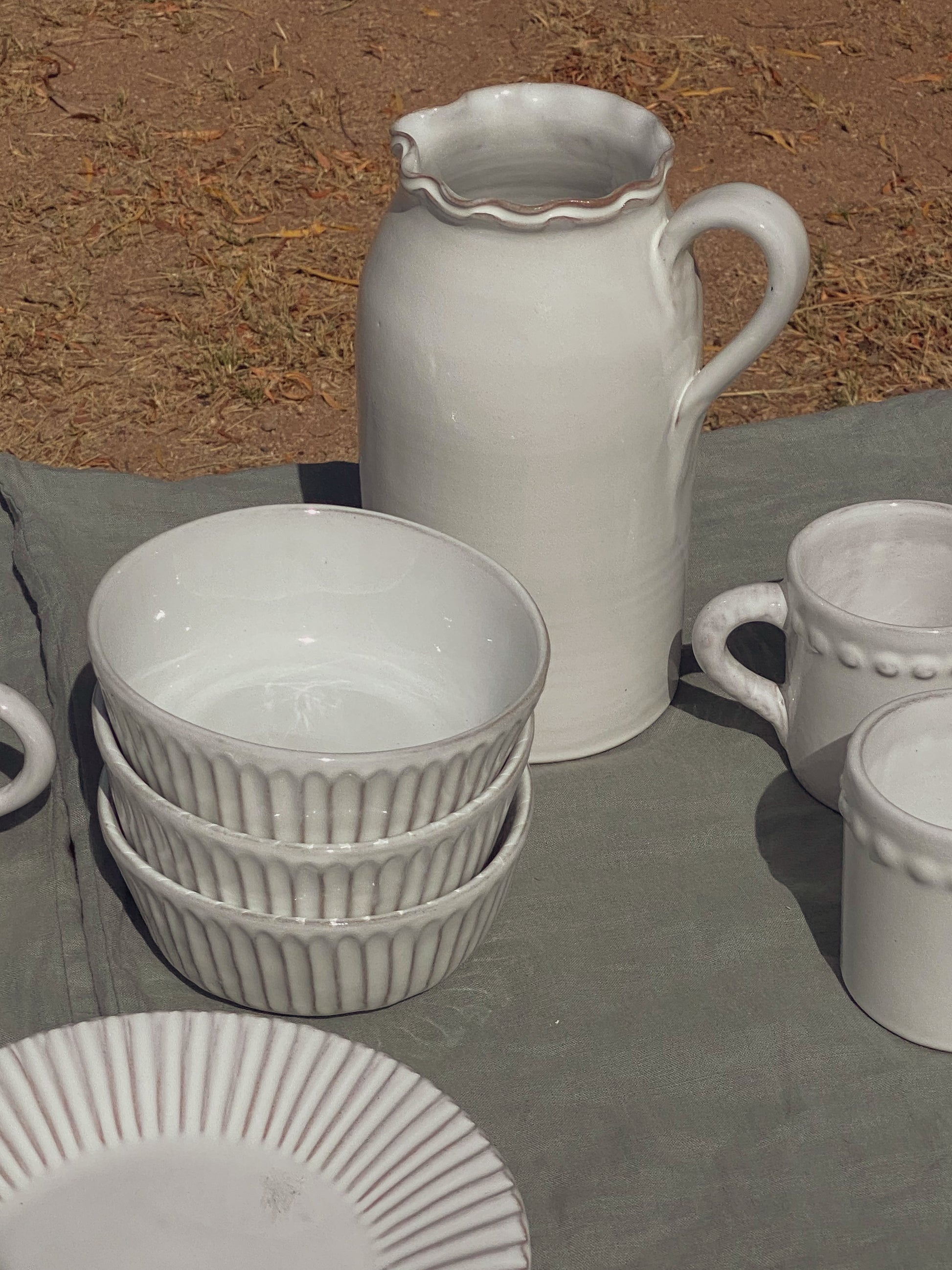 white terracotta pitcher