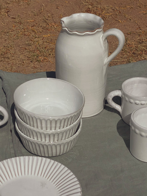 white terracotta bowls